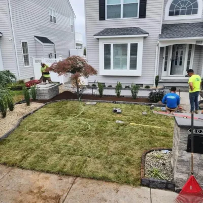 DiSandro-NJ-Home-Makeover-Crew-At-Work-Front-Yard