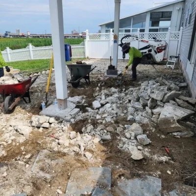 DiSandro-NJ-Home-Makeover-Crew-Breaking-Up-Stone